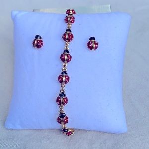 Joan rivers lady big earrings and bracelet